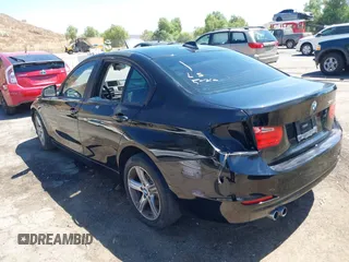 2015 BMW 3 Series 328i with VIN WBA3C1C55FK124096, listed as a IAAI auction lot 40127884 with Not Provided miles and . Bid and sale history available at carsss.com. Image 3.