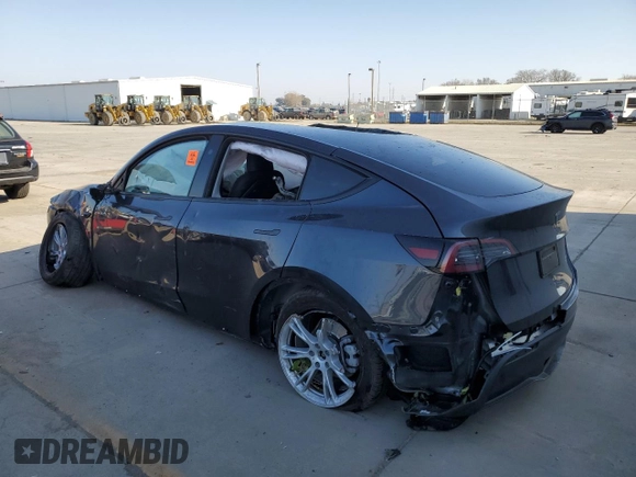 2024 Tesla Model Y Long Range with VIN 7SAYGDEE6RF063230, listed as a Copart auction lot 42872535 with Not Provided miles and Salvage Title. Bid and sale history available at DreamBid. Image 2.