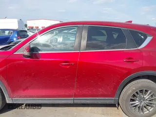 2017 Mazda CX-5 Touring with VIN JM3KFACL3H0195212, listed as a IAAI auction lot 42041361 with 57,377 mi miles and . Bid and sale history available at carsss.com. Image 14.