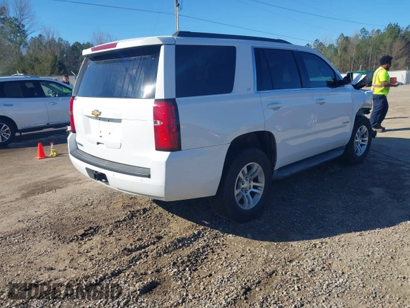 2015 Chevrolet Tahoe LT with VIN 1GNSCBKC0FR104096, listed as a IAAI auction lot 41679298 with 231,005 mi miles and . Bid and sale history available at DreamBid. Image 4.