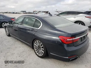 2017 BMW 7 Series 740i xDrive with VIN WBA7E4C5XHGU99064, listed as a Copart auction lot 70792133 with 122,264 mi miles. Bid and sale history available at carsss.com. Image 2.
