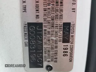 1986 Toyota MR2 z VIN JT2AW15C7G0083196, wystawiony jako Copart lot #74149374 z przebiegiem 30 771 mil mil oraz Nie do naprawy. Historia ofert i sprzedaży dostępna na DreamBid. Obrazek 13.