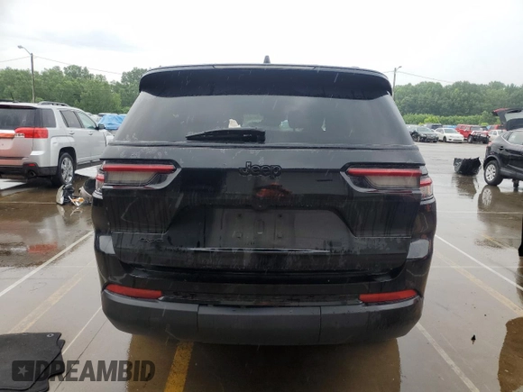 2023 Jeep Grand Cherokee Laredo with VIN 1C4RJKAG9P8829088, listed as a Copart auction lot 60099345 with 83,319 mi miles and Salvage title. Bid and sale history available at DreamBid. Image 6.