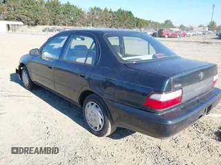1997 Toyota Corolla with VIN 2T1BA02E0VC162383, listed as a IAAI auction lot 40715985 with 141,713 mi miles and . Bid and sale history available at DreamBid. Image 3.