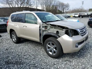2010 Lexus GX 460 with VIN JTJBM7FX3A5011991, listed as a Copart auction lot 52017695 with 113,068 mi miles and Clean Title. Bid and sale history available at DreamBid. Image 4.
