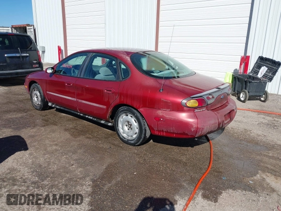 1997 Ford Taurus GL z VIN 1FALP52U2VA207986, wystawiony jako IAAI lot #41606014 z przebiegiem 225 124 mil mil oraz . Historia ofert i sprzedaży dostępna na DreamBid. Obrazek 3.
