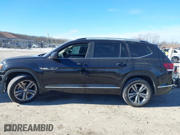 2019 Volkswagen Atlas SEL R-Line z VIN 1V2RR2CA6KC509913, wystawiony jako IAAI lot #41410198 z przebiegiem 97 681 mil mil oraz . Historia ofert i sprzedaży dostępna na DreamBid. Obrazek 14.