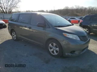 2014 Toyota Sienna L with VIN 5TDZK3DC4ES498196, listed as a Copart auction lot 50214285 with 239,718 mi miles and Clean Title. Bid and sale history available at carsss.com. Image 4.