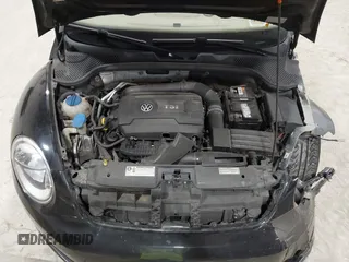 2014 Volkswagen Beetle 1.8T с VIN 3VW517AT5EM818796, выставлен на аукционе IAAI как лот 42318653 с пробегом 150 443 миль миль и . История ставок и продаж доступна на DreamBid. Изображение 10.