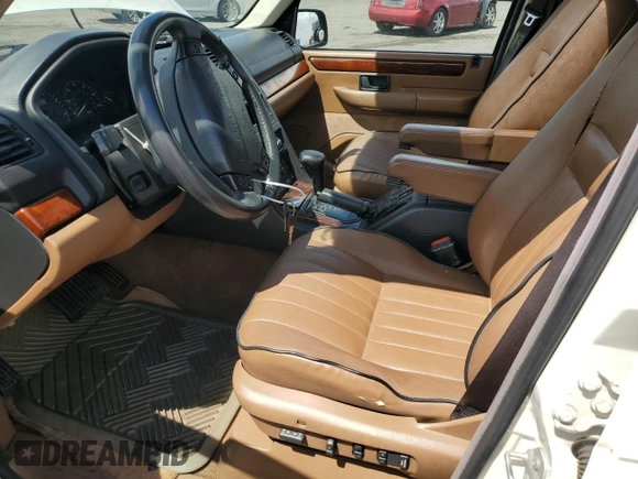 1998 Land Rover Range Rover z VIN SALPV1243WA383806, wystawiony jako Copart lot #58947165 z przebiegiem 156 937 mil mil oraz Czysty tytuł • Clean title. Historia ofert i sprzedaży dostępna na DreamBid. Obrazek 7.