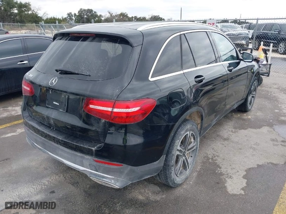 2018 Mercedes-Benz GLC with VIN WDC0G4JB0JV090624, listed as a IAAI auction lot 41382313 with 80,276 mi miles. Bid and sale history available at carsss.com. Image 4.