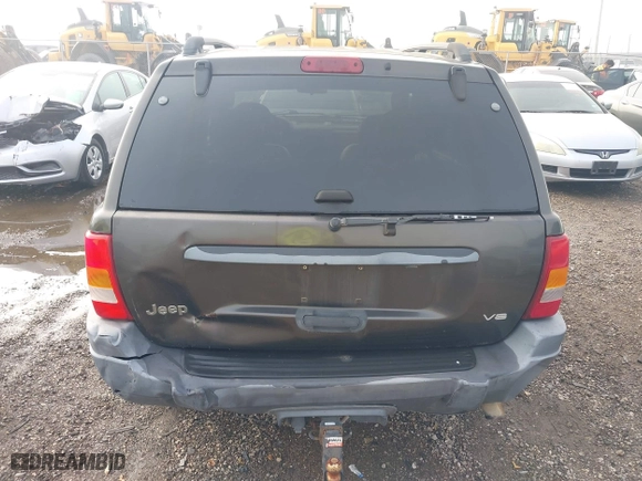 2004 Jeep Grand Cherokee Laredo with VIN 1J4GX48N74C385749, listed as a IAAI auction lot 41877421 with 141,255 mi miles. Bid and sale history available at carsss.com. Image 6.