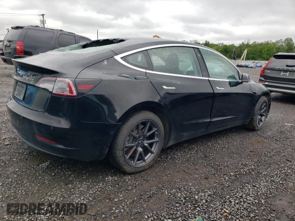 2019 Tesla Model 3 Mid Range z VIN 5YJ3E1EA0KF394514, wystawiony jako Copart lot #58051215 z przebiegiem Nie podano mil oraz Szkody całkowita. Historia ofert i sprzedaży dostępna na DreamBid. Obrazek 3.