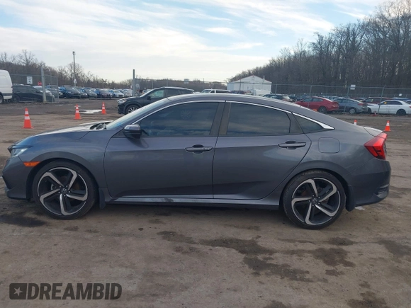2019 Honda Civic Sport with VIN 2HGFC2F8XKH503867, listed as a IAAI auction lot 41533506 with 66,650 mi miles and . Bid and sale history available at DreamBid. Image 14.