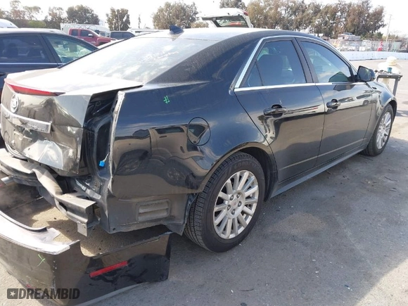 2011 Cadillac CTS Sedan with VIN 1G6DA5EY5B0109599, listed as a IAAI auction lot 41696477 with 95,786 mi miles. Bid and sale history available at carsss.com. Image 4.