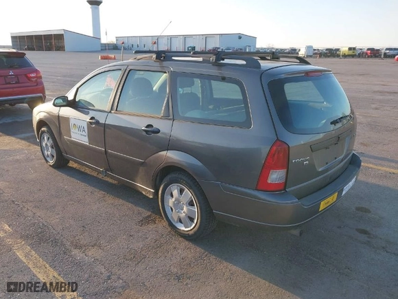 2006 Ford Focus SE with VIN 1FAHP36N16W228667, listed as a IAAI auction lot 41965634 with 141,460 mi miles. Bid and sale history available at carsss.com. Image 3.