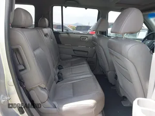 2011 Honda Pilot Touring z VIN 5FNYF3H90BB006634, wystawiony jako IAAI lot #42388390 z przebiegiem 218 475 mil mil oraz . Historia ofert i sprzedaży dostępna na DreamBid. Obrazek 8.