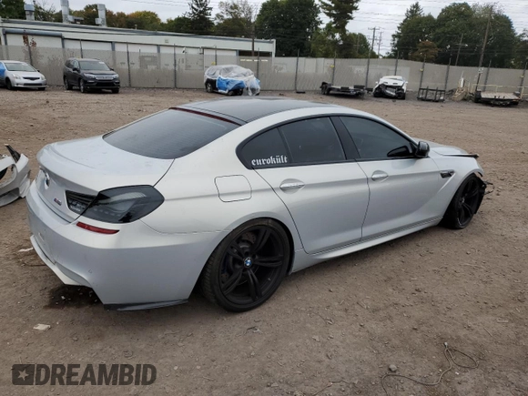 2015 BMW M6 z VIN WBS6C9C55FD467907, wystawiony jako Copart lot #72682374 z przebiegiem 25 841 mil mil oraz Szkoda całkowita • Salvage title. Historia ofert i sprzedaży dostępna na DreamBid. Obrazek 3.