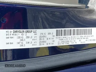 2013 Dodge Grand Caravan SXT with VIN 2C4RDGCG3DR611519, listed as a IAAI auction lot 42237571 with 156,858 mi miles and . Bid and sale history available at DreamBid. Image 9.
