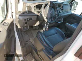 2021 Ford Transit Cargo with VIN 1FTBW3X83MKA40734, listed as a Copart auction lot 77427214 with Not Provided miles and Salvage Title. Bid and sale history available at carsss.com. Image 8.