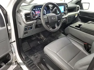 2022 Ford F-150 XL z VIN 1FTFW1ED0NFC41149, wystawiony jako IAAI lot #42785423 z przebiegiem 22 280 mil mil oraz . Historia ofert i sprzedaży dostępna na DreamBid. Obrazek 18.