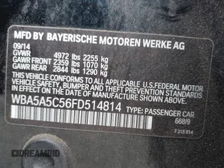 2015 BMW 5 Series 528i with VIN WBA5A5C56FD514814, listed as a IAAI auction lot 42052381 with 76,306 mi miles. Bid and sale history available at carsss.com. Image 9.