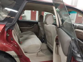 2003 Subaru Legacy Outback with VIN 4S3BH665137641063, listed as a IAAI auction lot 42343615 with 90,602 mi miles and . Bid and sale history available at DreamBid. Image 8.