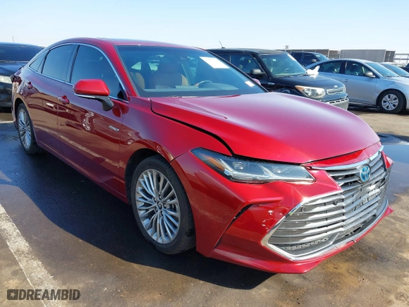 2019 Toyota Avalon Hybrid Limited with VIN 4T1B21FB8KU010221, listed as a IAAI auction lot 41470592 with 100,869 mi miles. Bid and sale history available at carsss.com. Image 1.