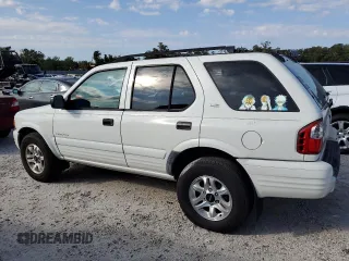 2002 Isuzu Rodeo S z VIN 4S2CK58W424342189, wystawiony jako Copart lot #76187294 z przebiegiem 139 827 mil mil oraz Szkody całkowita. Historia ofert i sprzedaży dostępna na DreamBid. Obrazek 2.