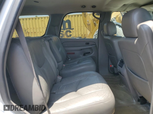 2004 Chevrolet Tahoe LS z VIN 1GNEC13T94R165160, wystawiony jako Copart lot #59994985 z przebiegiem 303 473 mil mil oraz Szkoda całkowita • Salvage title. Historia ofert i sprzedaży dostępna na DreamBid. Obrazek 11.