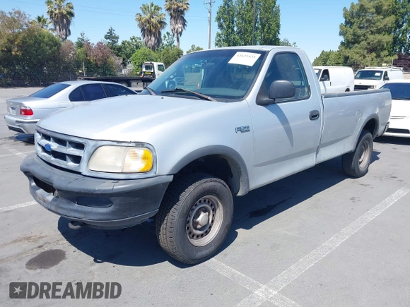 1997 Ford F-150 with VIN 1FTDF1828VKA26577, listed as a IAAI auction lot 42625435 with 310,779 mi miles and . Bid and sale history available at DreamBid. Image 2.