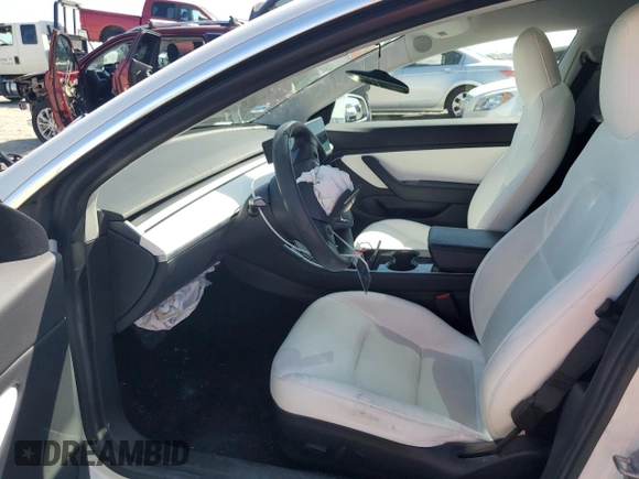 2020 Tesla Model 3 Standard Range Plus z VIN 5YJ3E1EA5LF741093, wystawiony jako Copart lot #52891695 z przebiegiem 59 168 mil mil oraz Szkoda całkowita • Salvage title. Historia ofert i sprzedaży dostępna na DreamBid. Obrazek 7.