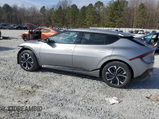 2022 Kia EV6 GT-Line with VIN KNDC44LA1N5056214, listed as a Copart auction lot 42428245 with 95,835 mi miles and Salvage Title. Bid and sale history available at DreamBid. Image 2.