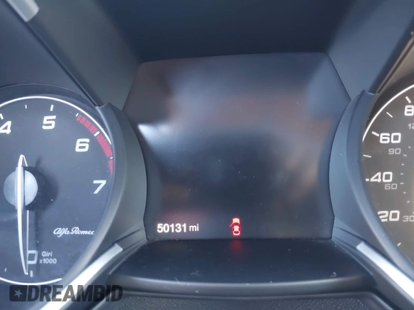 2018 Alfa Romeo Stelvio z VIN ZASFAKAN3J7C20066, wystawiony jako IAAI lot #40879859 z przebiegiem 50 131 mil mil oraz . Historia ofert i sprzedaży dostępna na DreamBid. Obrazek 7.