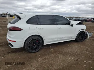 2016 Porsche Cayenne GTS with VIN WP1AD2A27GLA76553, listed as a Copart auction lot 53569615 with 69,761 mi miles and Salvage title. Bid and sale history available at DreamBid. Image 3.