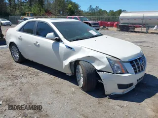 2012 Cadillac CTS with VIN 1G6DA5E51C0151324, listed as a IAAI auction lot 41811207 with 100,407 mi miles and . Bid and sale history available at DreamBid. Image 1.