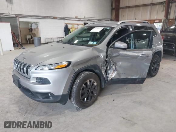 2016 Jeep Cherokee Latitude z VIN 1C4PJMCB9GW148882, wystawiony jako IAAI lot #42210237 z przebiegiem 124 441 mil mil oraz . Historia ofert i sprzedaży dostępna na DreamBid. Obrazek 2.