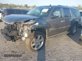 2011 GMC Yukon XL Denali with VIN 1GKS2MEF4BR280225, listed as a IAAI auction lot 41732220 with 121,684 mi miles. Bid and sale history available at carsss.com. Image 2.