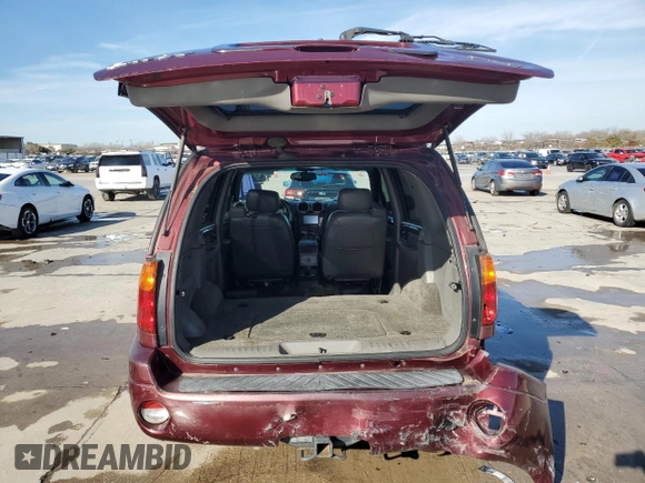 2003 GMC Envoy SLT with VIN 1GKDT13S732378731, listed as a Copart auction lot 88340825 with 125,814 mi miles and Salvage Title. Bid and sale history available at carsss.com. Image 6.