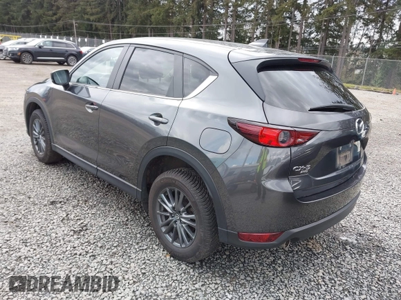 2021 Mazda CX-5 Touring with VIN JM3KFBCM2M0484011, listed as a IAAI auction lot 41825954 with 48,958 mi miles. Bid and sale history available at carsss.com. Image 3.