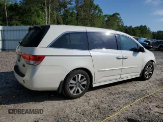 2016 Honda Odyssey Touring Elite with VIN 5FNRL5H97GB129217, listed as a Copart auction lot 52177765 with 138,045 mi miles and Salvage Title. Bid and sale history available at DreamBid. Image 3.