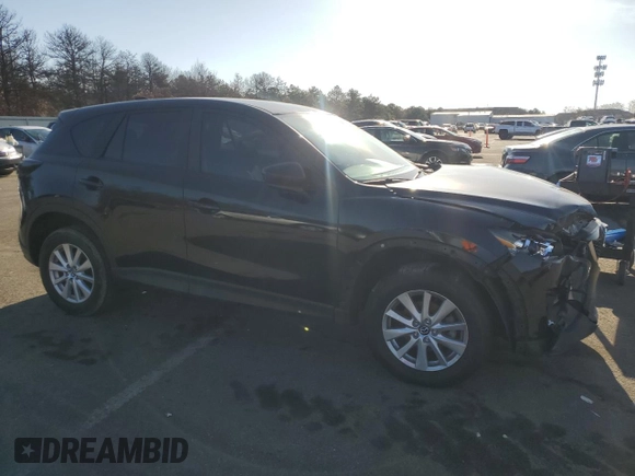 2014 Mazda CX-5 Sport with VIN JM3KE4BE1E0371547, listed as a Copart auction lot 85412744 with 119,597 mi miles and Salvage Title. Bid and sale history available at carsss.com. Image 4.