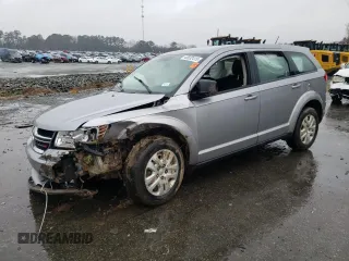 2015 Dodge Journey American Value Pkg with VIN 3C4PDCAB5FT574397, listed as a Copart auction lot 42032415 with 118,111 mi miles and Salvage Title. Bid and sale history available at carsss.com. Image 1.