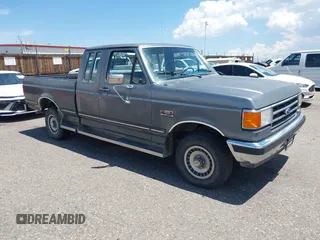 1989 Ford F-150 with VIN 1FTEX14N7KKB70604, listed as a IAAI auction lot 42640819 with 13,553 mi miles and . Bid and sale history available at DreamBid. Image 1.