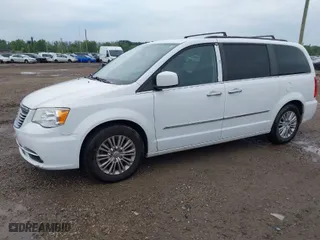2015 Chrysler Town & Country Touring-L with VIN 2C4RC1CG6FR693233, listed as a IAAI auction lot 40095750 with 149,563 mi miles. Bid and sale history available at carsss.com. Image 2.