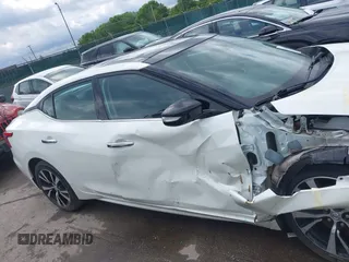2018 Nissan Maxima SL with VIN 1N4AA6AP2JC395188, listed as a IAAI auction lot 42540832 with 106,898 mi miles and . Bid and sale history available at DreamBid. Image 14.