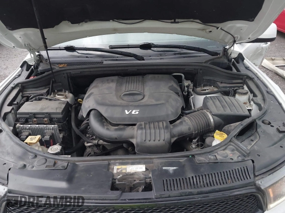 2014 Dodge Durango SXT with VIN 1C4RDJAG0EC561950, listed as a IAAI auction lot 42650331 with 106,959 mi miles and . Bid and sale history available at DreamBid. Image 10.