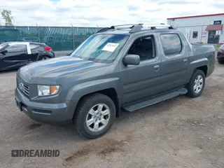 2007 Honda Ridgeline RTL z VIN 2HJYK16517H511157, wystawiony jako IAAI lot #42257637 z przebiegiem 266 894 mil mil oraz . Historia ofert i sprzedaży dostępna na DreamBid. Obrazek 2.