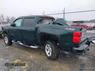 2014 Chevrolet Silverado 1500 LT with VIN 3GCUKREC1EG516826, listed as a IAAI auction lot 41119573 with 164,844 mi miles and . Bid and sale history available at DreamBid. Image 3.