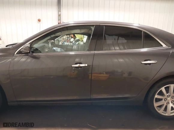 2013 Chevrolet Malibu LTZ with VIN 1G11H5SA0DF288078, listed as a IAAI auction lot 41441128 with 92,318 mi miles. Bid and sale history available at carsss.com. Image 15.